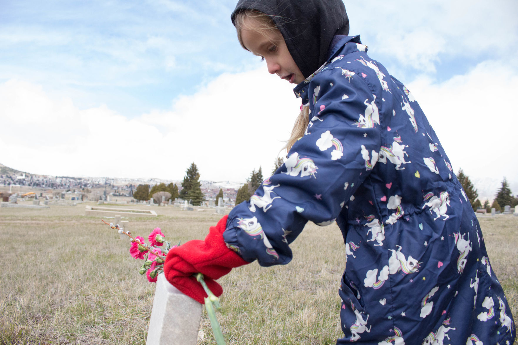 Flowers and willow boughs placed on graves of Butte's Chinese families